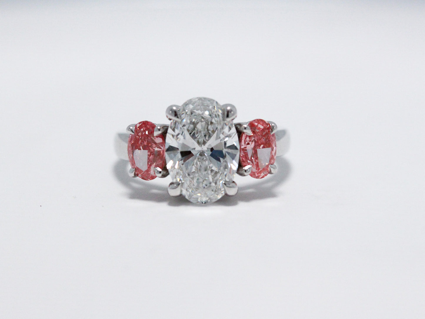 Oval Cut Three Stone with Pink Side Stones
